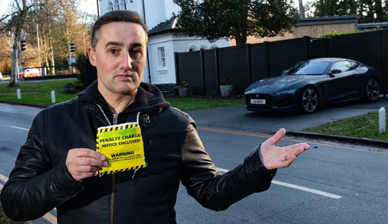 Furious homeowner vows to fight council after being fined for parking outside his house