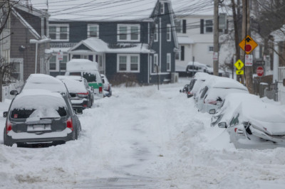 Boston Residents Use Trash Cans, Tables, Chairs To Save Hard-Earned Parking Spaces After Snowstorm