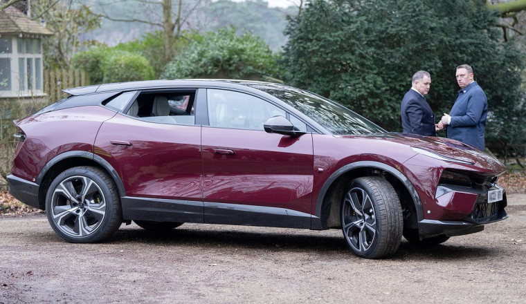 King Charles and Queen Camilla seen for the first time in their new electric £160,000 Lotus Eletre sportscar that he jokes is 'silent but deadly'