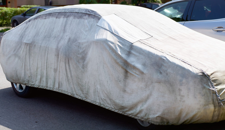 Here's How To Clean Your Car Cover Unless You Actually Like Mold
