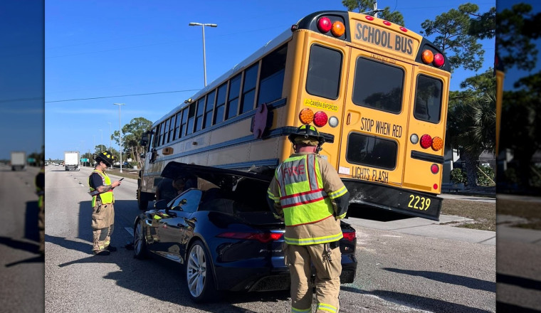 Jaguar F-Type Driver Survives Stuffing Car Under Back Of Stopped School Bus
