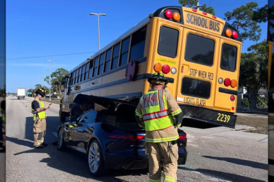 Jaguar F-Type Driver Survives Stuffing Car Under Back Of Stopped School Bus