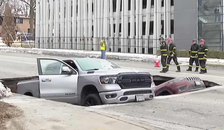 Hungry Omaha Road Gobbles Two Vehicles In Spontaneous Sinkhole