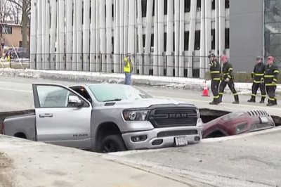Hungry Omaha Road Gobbles Two Vehicles In Spontaneous Sinkhole