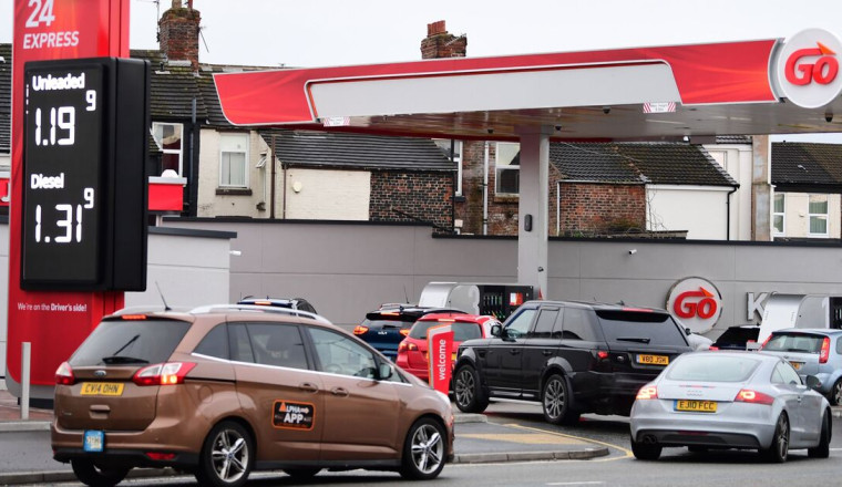 Huge queues at UK petrol stations as panic buying drivers fear fuel price rise