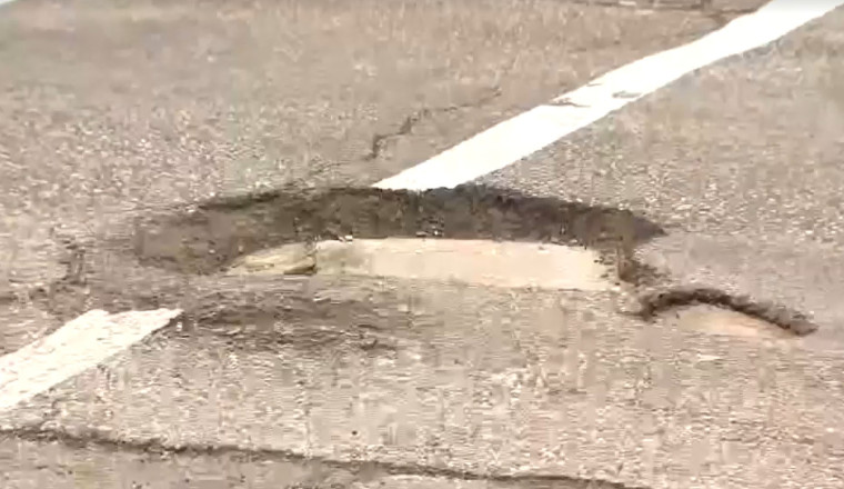 18-Year-Old Metro Detroit Pothole Filler Shows The City How To Do Their Job