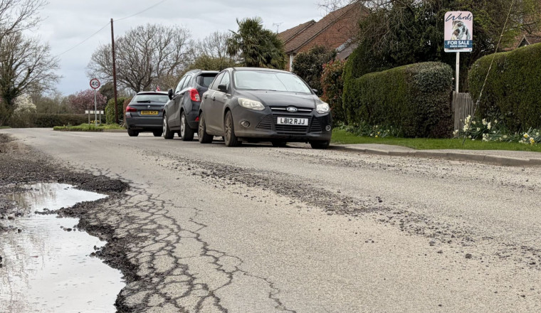 What causes pothole damage on our roads?
