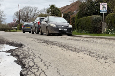 What causes pothole damage on our roads?