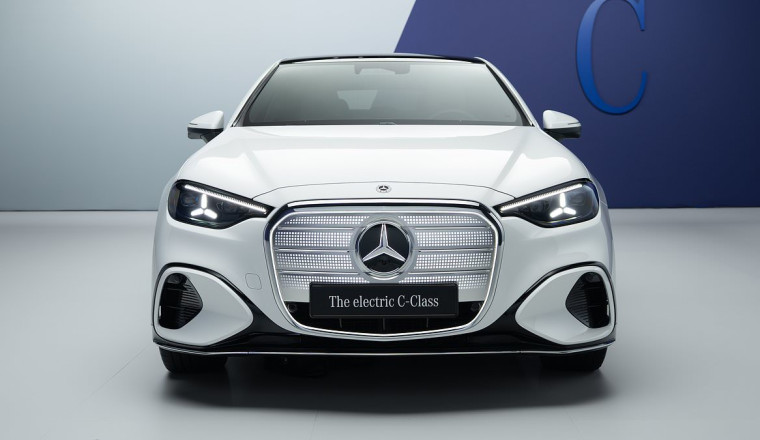 Mercedes unleashes its new electric C-Class - but its 473-mile range is no match for its biggest rival