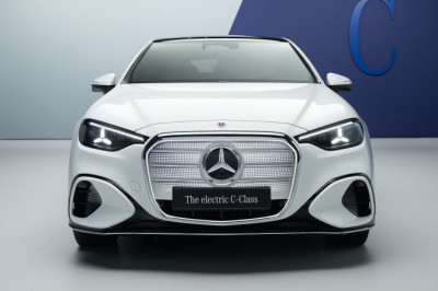 Mercedes unleashes its new electric C-Class - but its 473-mile range is no match for its biggest rival