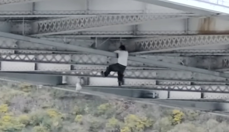 Suspected Car Thief Spider-Mans Through Underside Of Bridge Trying To Escape Police