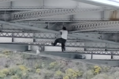 Suspected Car Thief Spider-Mans Through Underside Of Bridge Trying To Escape Police