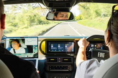 Women smile twice as much as men when driving, AI study suggests