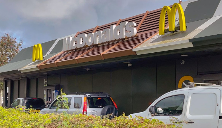 What UK law says about paying on phone at a drive thru