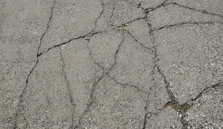 How To Fix Unsightly Concrete Cracks Like A DIY Master