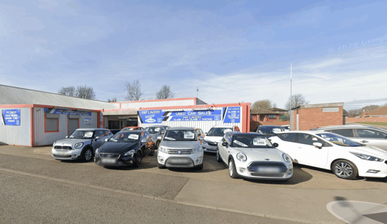 Two arrested after criminal damage at family-run used car dealership