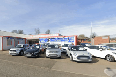 Two arrested after criminal damage at family-run used car dealership