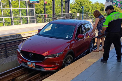 GPS Said "Drive Onto The Train Tracks" - So She Did!