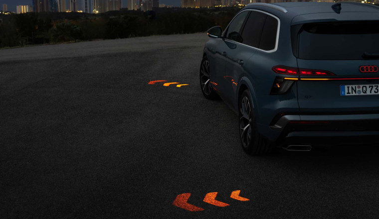 The New Audi Q7 Projects Turn Signals Onto The Road