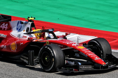 Hamilton takes first Ferrari win as Russell wilts and Antonelli retires